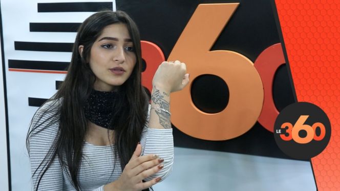 غلاف فيديو - بنت الستاتي- أنا لي شهرت "حليوة".. وها علاش الوشم.. وهذه قصة "البوسة" مع الرابورة أميمة غلاف فيديو - بنت الستاتي- أنا لي شهرت "حليوة".. وها علاش الوشم.. وهذه قصة "البوسة" مع الرابورة أميمة