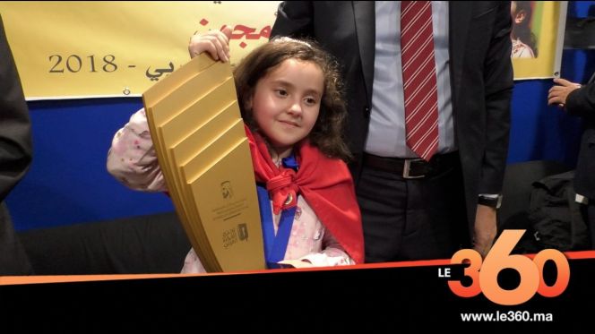 غلاف فيديو - أول تصريح للطفلة الفائزة بلقب تحدي القراءة العربي بعد عودتها إلى المغرب غلاف فيديو - أول تصريح للطفلة الفائزة بلقب تحدي القراءة العربي بعد عودتها إلى المغرب